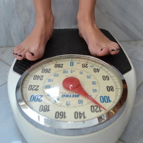 Person standing on a scale