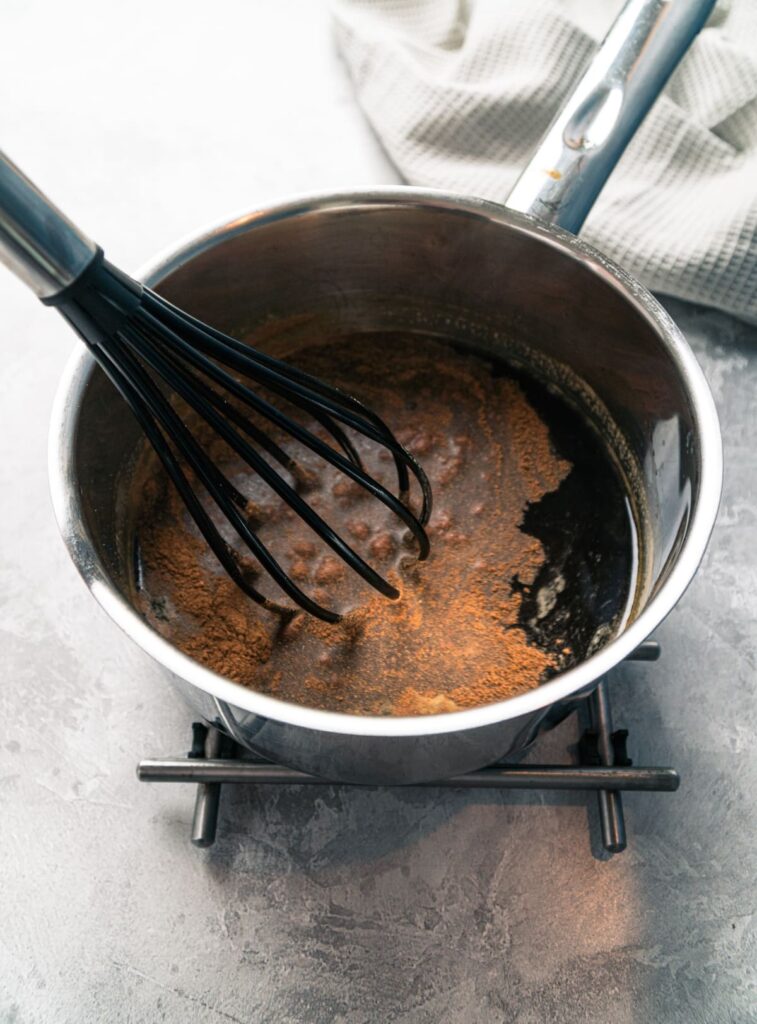 combining french toast syrup ingredients in a saucepan